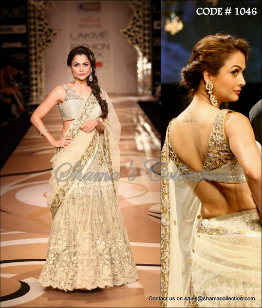 1046 Amrita Arora's cream bridal lehenga