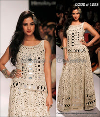 1053 Sonal Chauhan's off white bridal lehenga