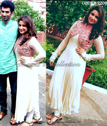 2209 Parineeti Chopra's white umbrella cut dress with pink jacket