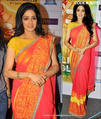 3075 Sridevi's orange-yellow saree