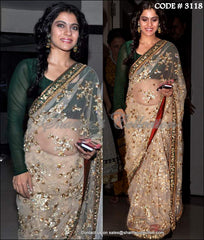 3118 Kajol's beige-bottle green saree